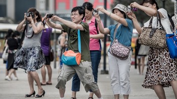 130517141050-china-tourists-hong-kong-camera-horizontal-gallery.jpg